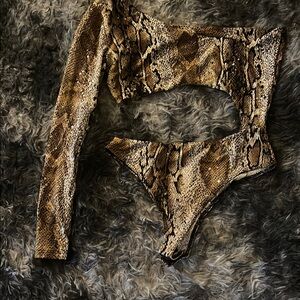 Reptile Patterned cutout onsie